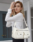 Small Shoulder Bag with Front Pockets and Chain Details