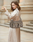Small Shoulder Bag with Front Pockets and Chain Details