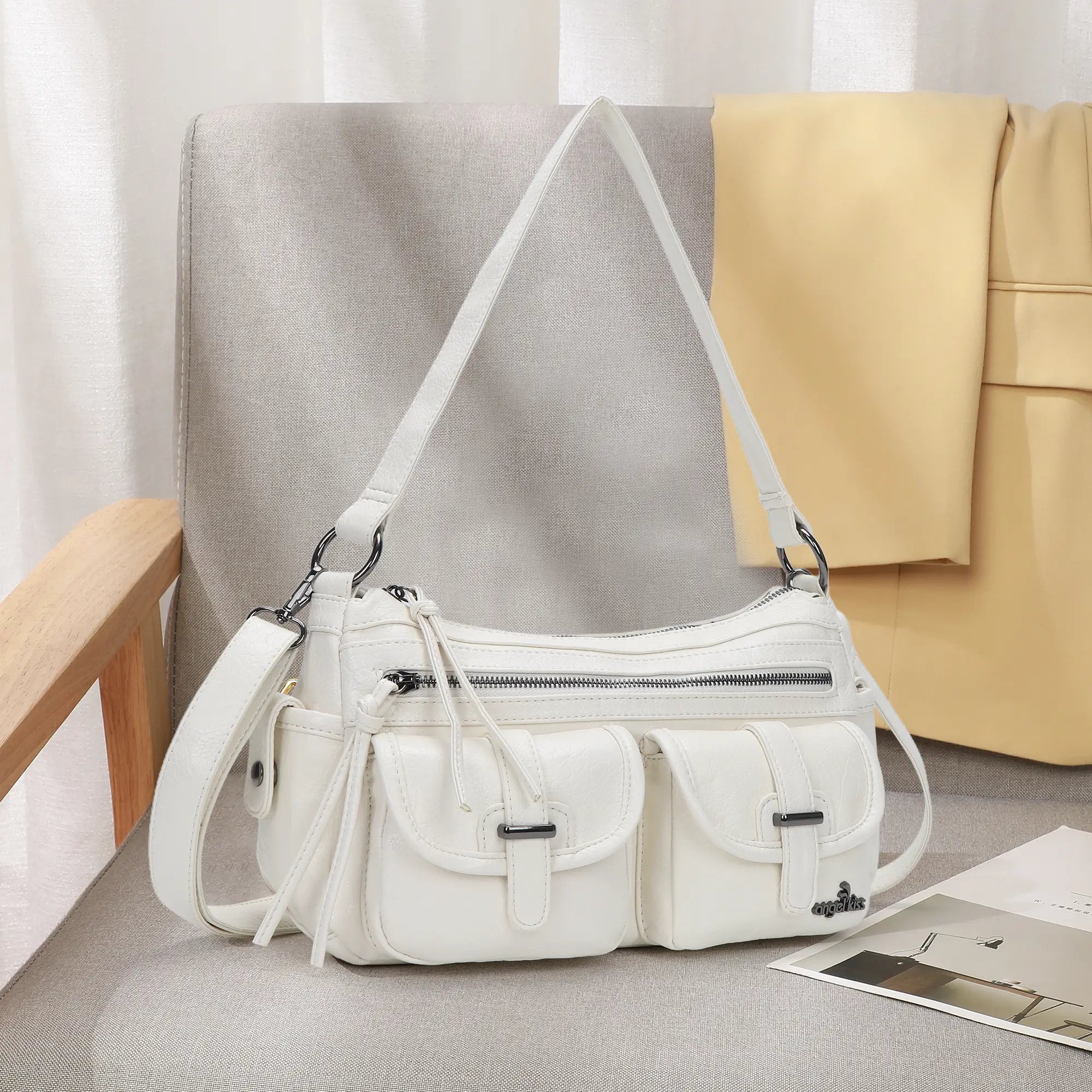 Small Shoulder Bag with Front Pockets and Chain Details