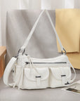 Small Shoulder Bag with Front Pockets and Chain Details